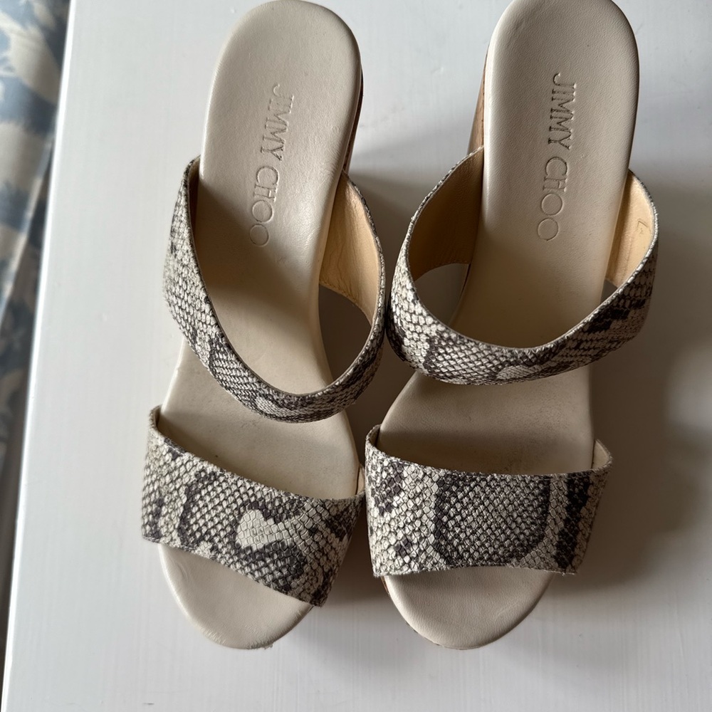 Jimmy Choo Black and Cream Mules with Elegant Design